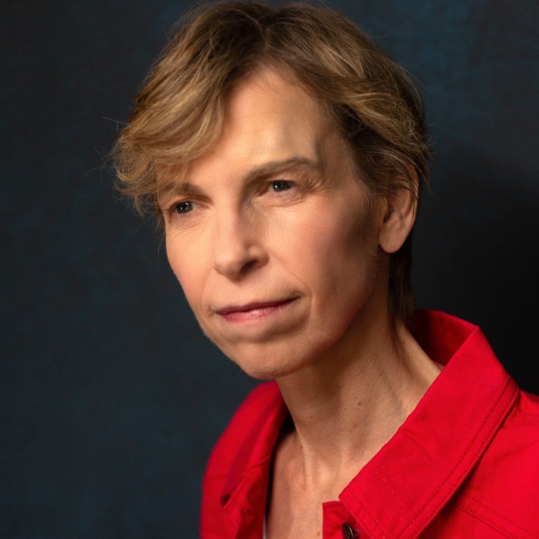 A headshot of actor Alex Bulmer.