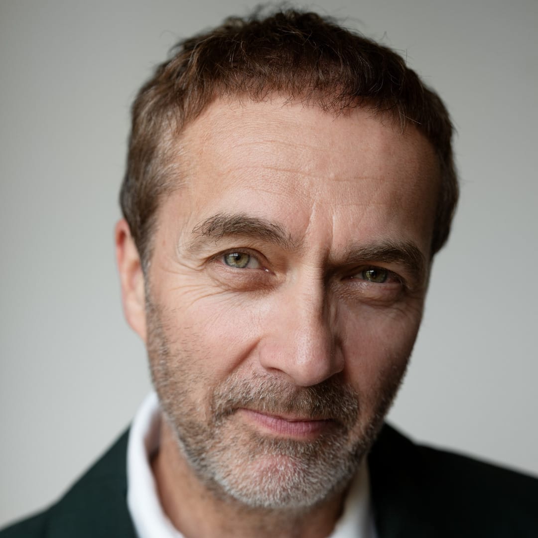 A headshot of actor Richard Emerson Gould.